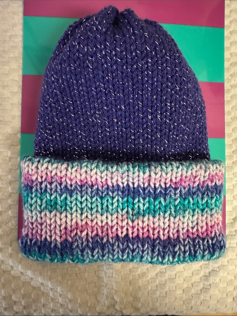 EUC Multicolor and silver threaded fold up rim, one size fits all knitted hat.